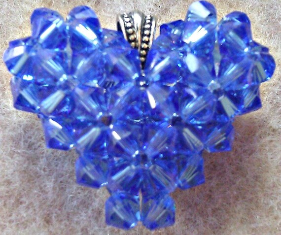 Items similar to Blue Sapphire Swarovski Crystal Puffy Heart Charm ...