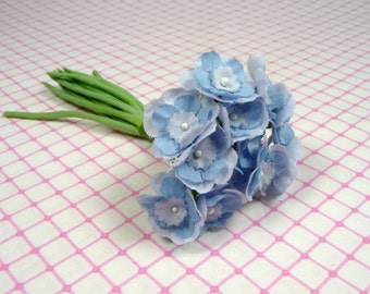 Sweet Little Primrose Old Fashioned Bouquet Millinery Flowers Baby Blue on Fabric Stems Bunch of One Dozen