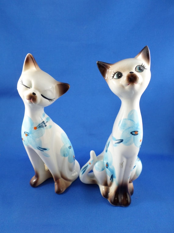 old cat figurines