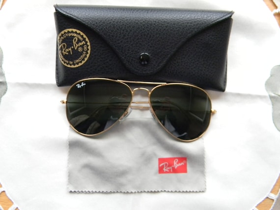 RB Ray Ban Sunglasses By LUXOTTICA. Made In by Tamtasvintage