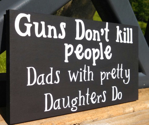 Items similar to Personalized Wood sign Guns don't kill people dads
