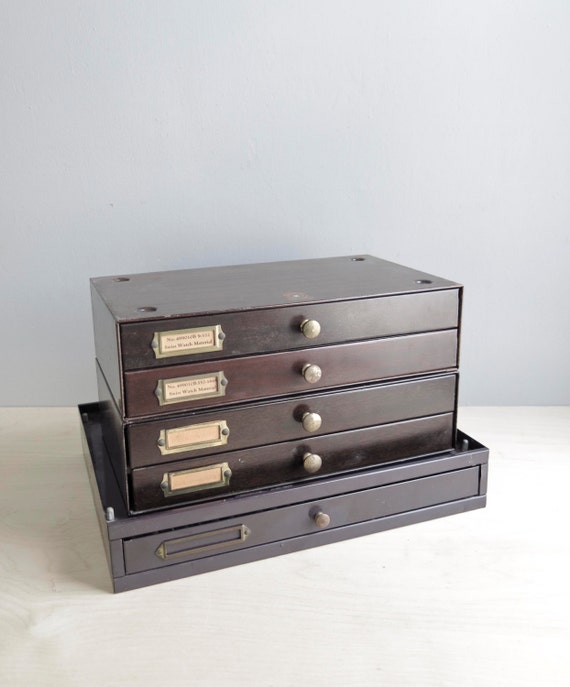 industrial metal watchmaker's and vials