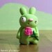 Green rabbit creature with pink rose - Original geeky gift for kids teens and adults - Fun desk accessory or funky home accent