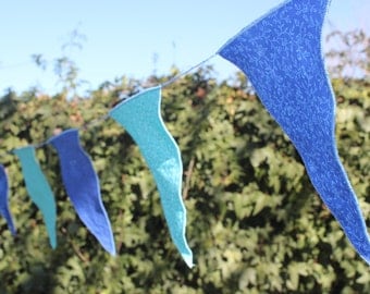 24 blue and turquoise flags