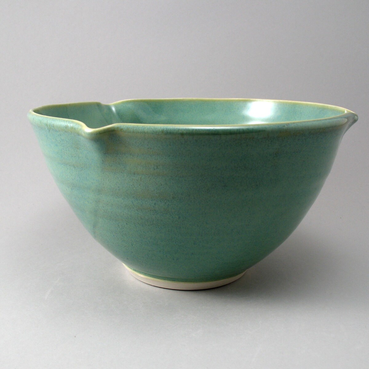 Wheel Thrown Bowl with a Fluted Rim and Finished in a Pearl