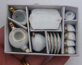 1 White and gold porcelain tea set