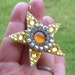 RESERVED for Tanya Sunshine 2 1/4" shining star, yellow, flower, LOTR, Arwen, Galadriel, fantasy, festival, glittery star, daffodil