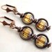 Copper and Amber Earrings with Circle Saturn Rings and Picasso Czech glass beads - Modern Victorian Steampunk Earrings