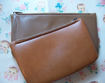 two little vinyl pouches