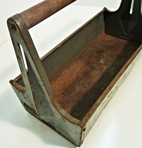 rusty metal craftsman early tool carrier grey metal wood