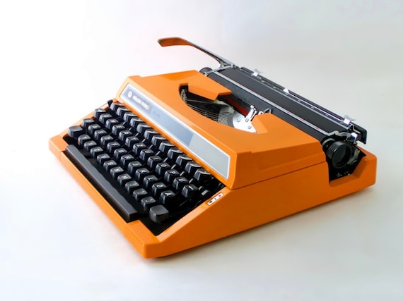 Vintage typewriter orange SilverReed from 70s by ArtmaVintage