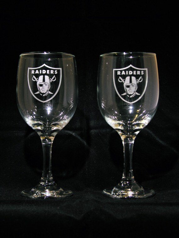 Pair of Oakland Raiders hand etched wine glasses Made in USA