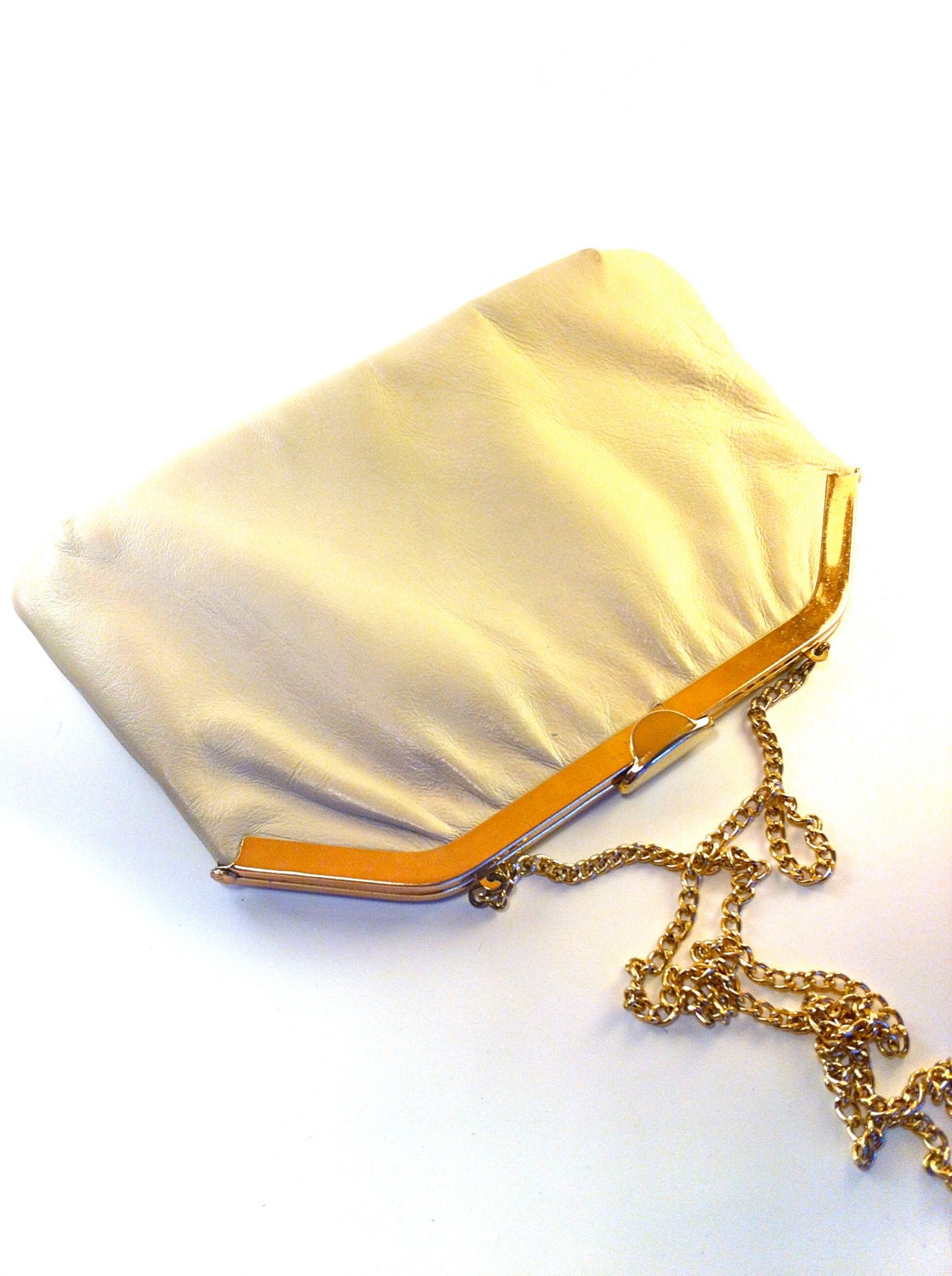 white and gold clutch purse