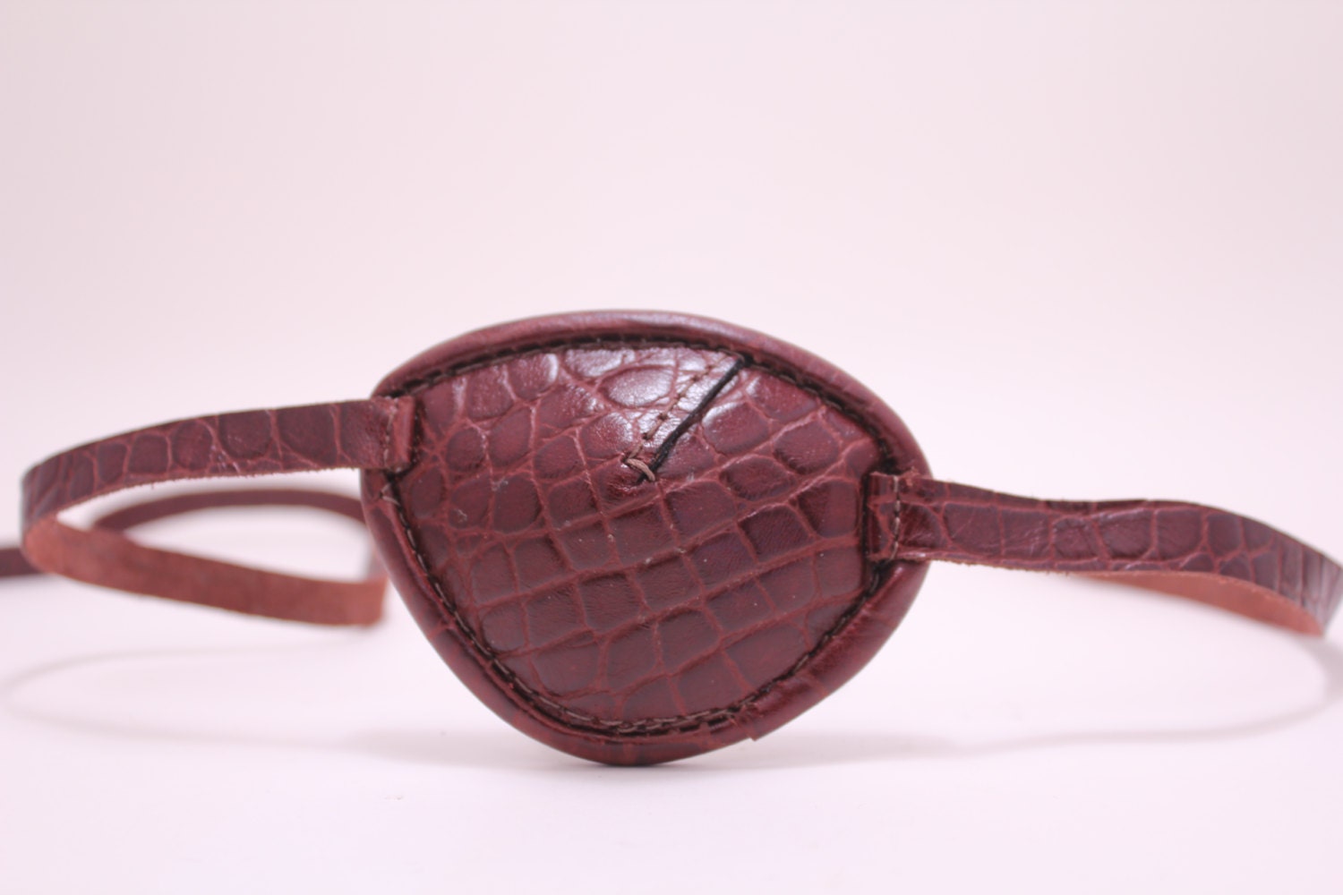 Brown leather eye patch