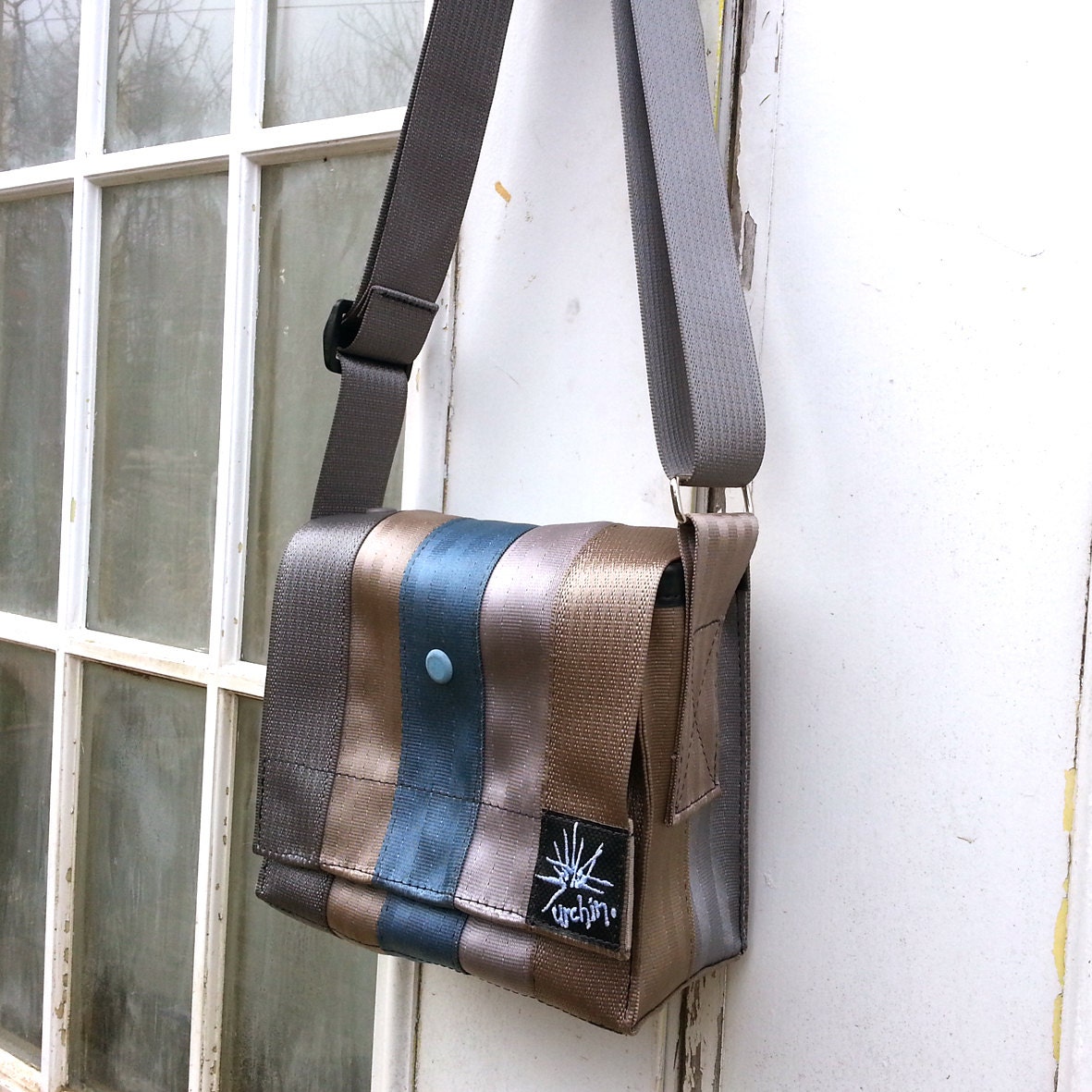 Purse handbag made from reclaimed seatbelts.