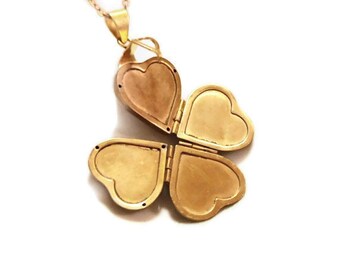Folding Heart Locket..that opens into a clover, can hold 4 photos OR get it custom engraved for free