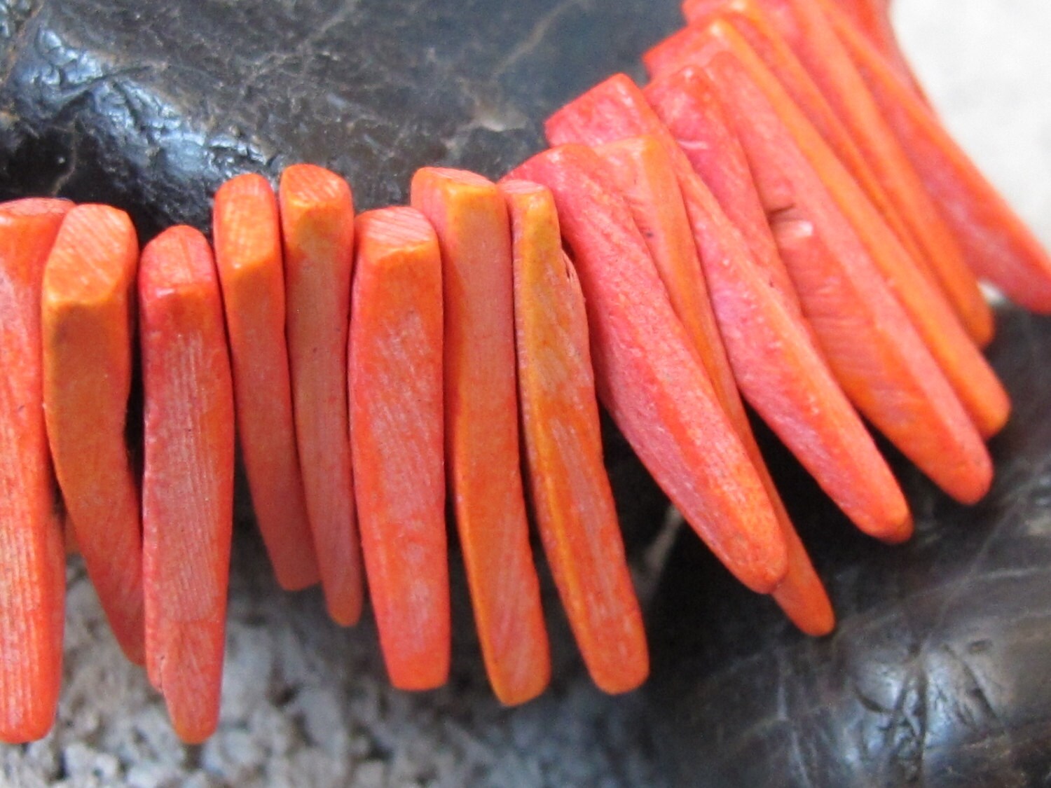 Orange coconut sticks Full Strand 15 inches 100 plus sticks