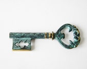 vintage key corkscrew in a key shape