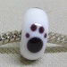 Handmade Glass Lampwork Bead Large Hole European Charm Bead Glass Paw Print Bead, White with Black Paw Prints