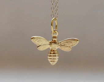 Tiny bee necklace in gold
