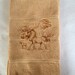 Moose Kitchen dish towel with four embroidered moose