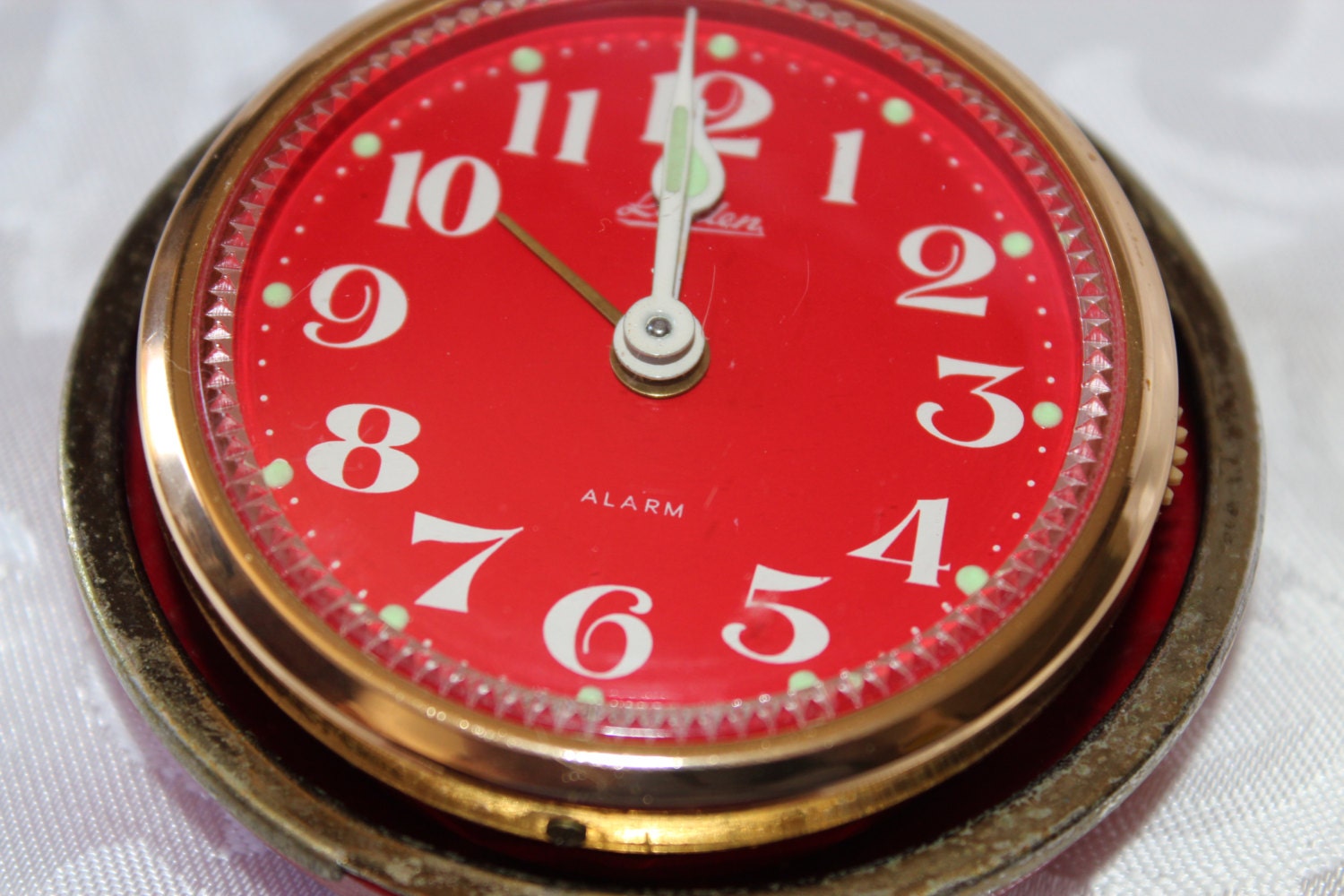 Linden Travel Alarm Clock with Glow Face in Round Red Case