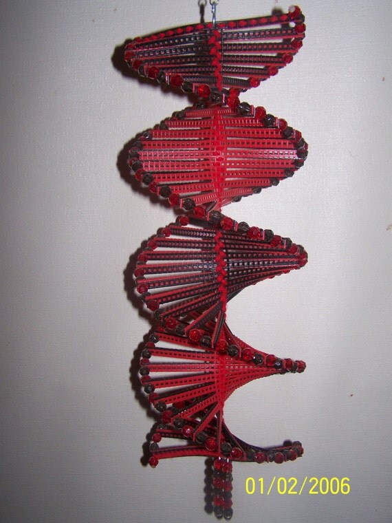 Wind Spinner made with plastic canvas and beads