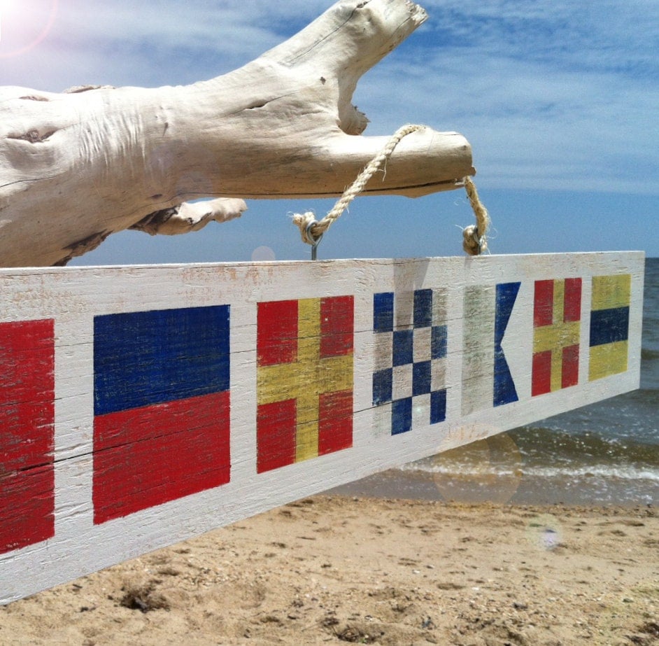 custom-nautical-flag-sign-on-reclaimed-wood