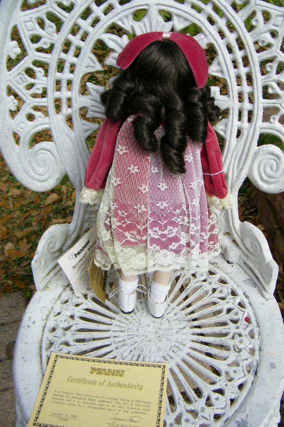 Collectible Porcelain Doll by Mann