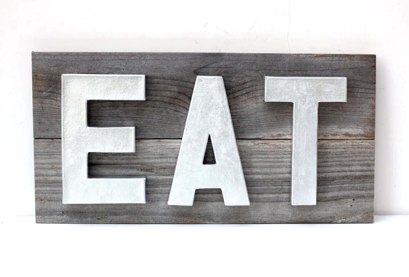 Eat wood. Reclaim Metal sign.