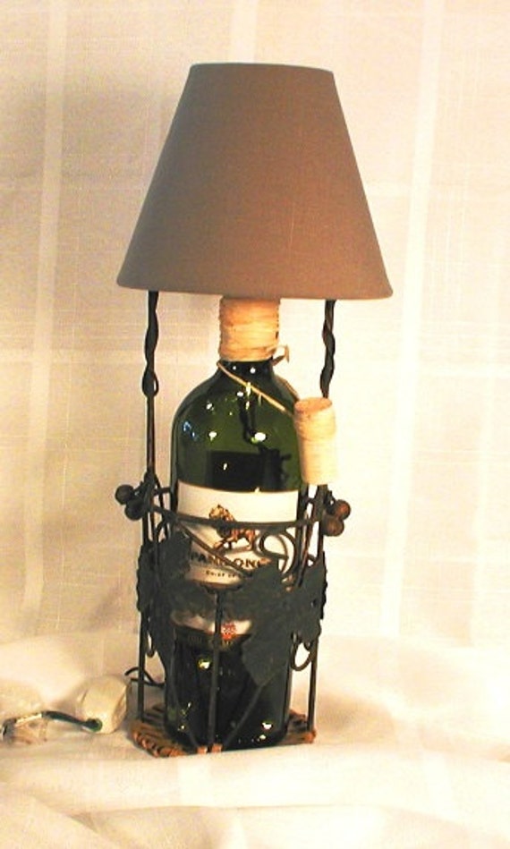 Wine bottle lamp with shade mounted in a by CRwinebottles on Etsy