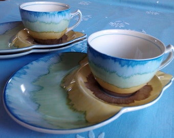 Very collectable hand-painted H&K Tunstall tennis sets