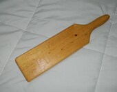 Pine adult spanking paddle.