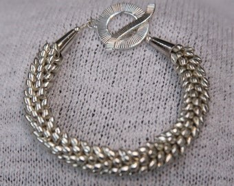 Silver magatama kumihimo bracelet beaded bracelet