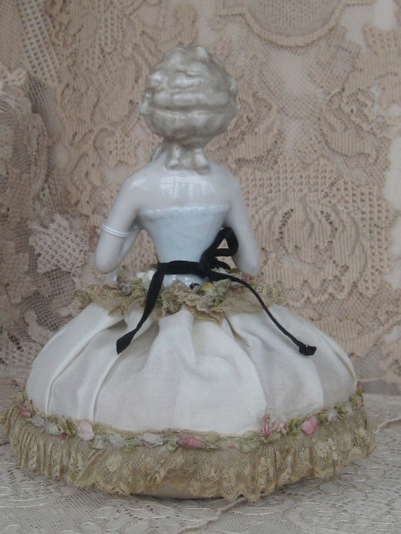 antique half doll pincushion