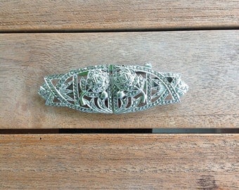 Vintage belt buckle turned into brooch