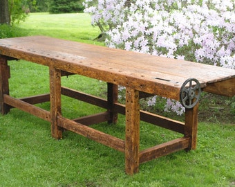 Antique turn of the century woodworking bench with vintage 