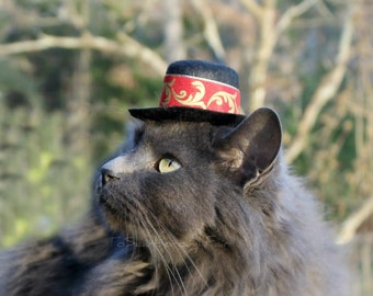 Hats for cats. The original by ToScarboroughFair on Etsy