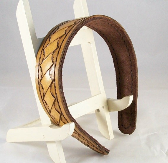 Wide leather headband with a western look