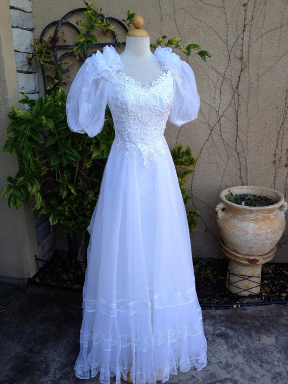 A vintage 1960s 1970s Eve of Milady white chiffon sheer beaded