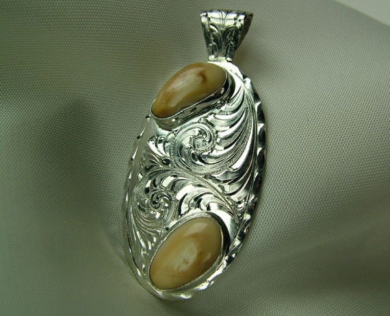 Elk Tooth Ivory and Sterling Silver Engraved by DouglasSilver