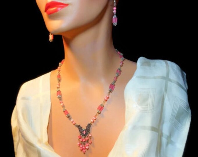 Pink fiber optic glass necklace and earrings made with upcycled beads and festoon beadwork earrings in silver plate