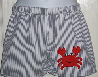 Twin aqua and red polka dot crab outfits Jon Jon and ruffle