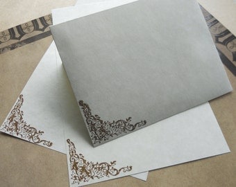 Parchment paper stationery set. Writing paper hand stamped with baroque motif border, set of 30.