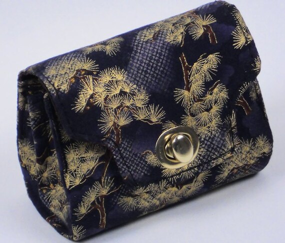 gold and navy clutch