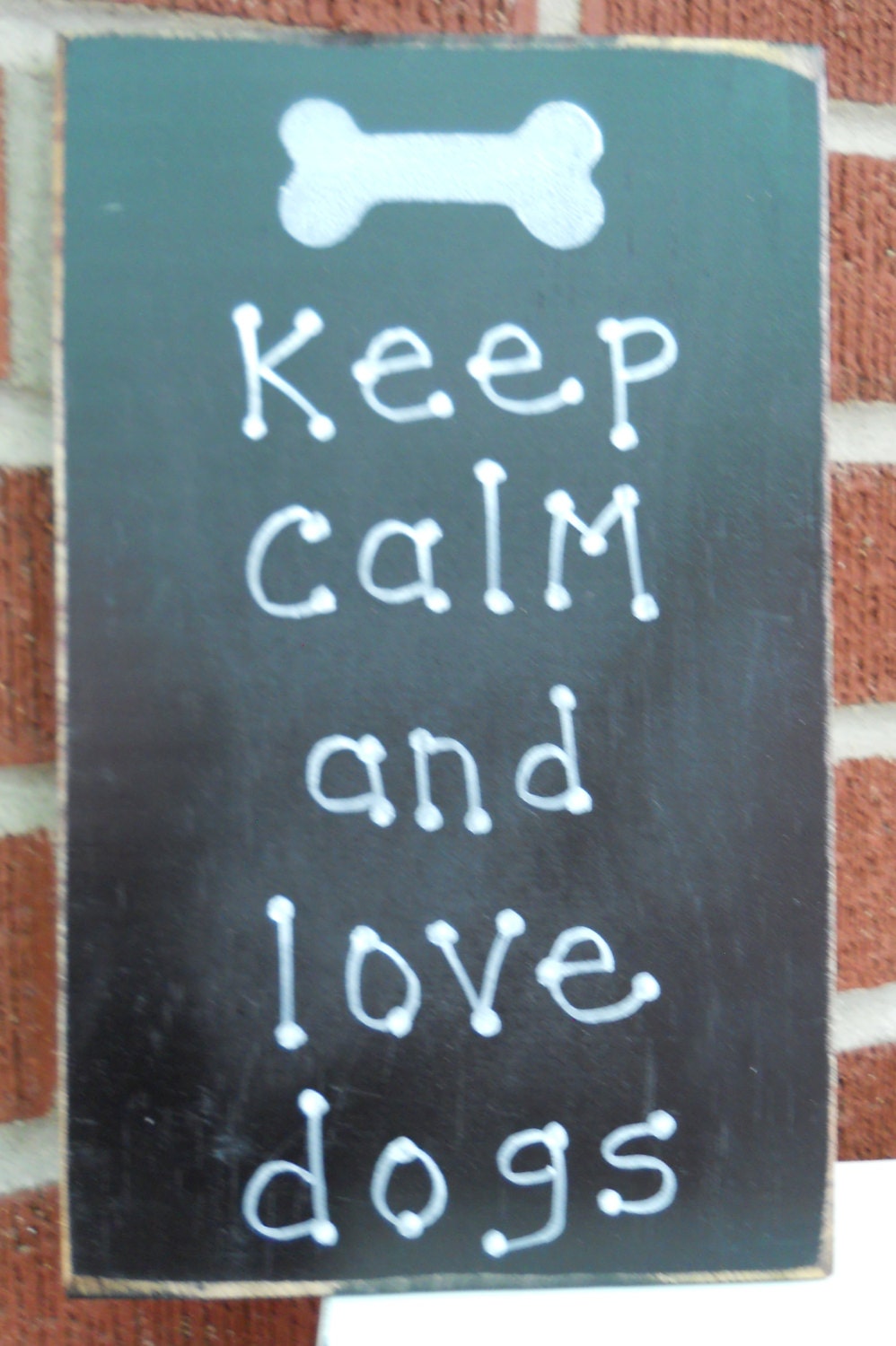 Keep calm and love dogs sign