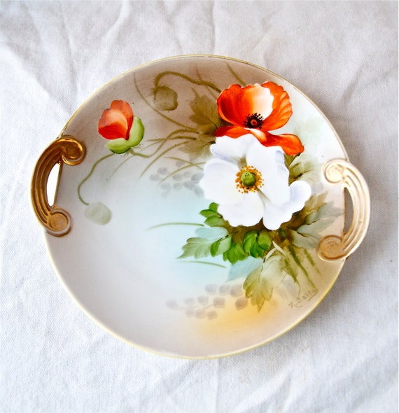 Vintage hand painted Noritake plate with handles...signed.