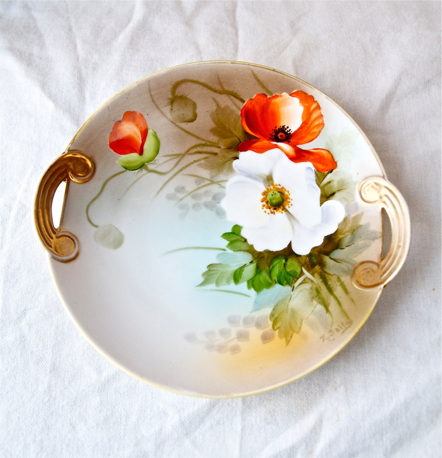 Vintage hand painted Noritake plate with by 180degreesvintage