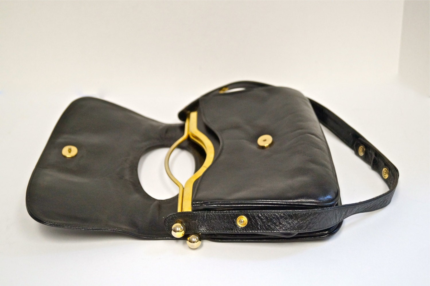 Vintage Peruzzi Black Leather Handbag with Gold Metal Hardware