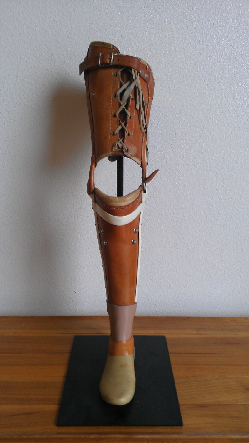 1930s-40s Prosthetic antique leg on custom iron stand